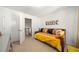 Bright, cozy room with a comfortable sofa, artwork and colorful pillows creates a welcoming atmosphere at 5157 Madeline, Stone Mountain, GA 30083