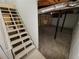 An unfinished basement with exposed beams and ductwork provides ample potential at 6092 Leverett Dr, Lithonia, GA 30038