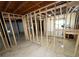 Spacious unfinished basement with framed walls offering customization options at 6092 Leverett Dr, Lithonia, GA 30038