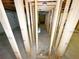 An unfinished basement with exposed wood framing provides ample potential at 6092 Leverett Dr, Lithonia, GA 30038