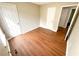 Empty bedroom with wood floors, offering flexibility for personalization and design at 6092 Leverett Dr, Lithonia, GA 30038