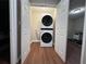 A laundry room with a stacked washer and dryer at 6092 Leverett Dr, Lithonia, GA 30038
