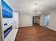Open-concept living room showcasing hardwood floors and a modern fireplace at 6092 Leverett Dr, Lithonia, GA 30038