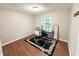 Well-lit office with a window and desk, offering a functional workspace at 6092 Leverett Dr, Lithonia, GA 30038
