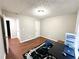 Cozy office space with wood floors and neutral paint, perfect for working from home at 6092 Leverett Dr, Lithonia, GA 30038