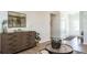 Cozy living room with modern furnishings and a stylish cabinet at 233 Silver Leaf Trce, Douglasville, GA 30134