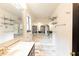 Bathroom with a jacuzzi tub and a marble-look floor at 2015 Brookstone Ct, Lithia Springs, GA 30122