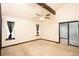 Bright bedroom with a ceiling fan and sliding doors leading to an enclosed balcony at 2015 Brookstone Ct, Lithia Springs, GA 30122