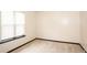 Bedroom featuring neutral carpet and trim plus a window offering natural light at 2015 Brookstone Ct, Lithia Springs, GA 30122