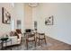 Bright open living room with high ceilings, fireplace, wood floors and neutral decor at 3647 Bancroft Main Nw, Kennesaw, GA 30144