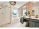Main bathroom features a soaking tub, double vanities, modern fixtures and decorative tile at 3647 Bancroft Main Nw, Kennesaw, GA 30144