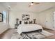 Main bedroom with wood floors, natural light, tray ceiling and neutral color scheme at 3647 Bancroft Main Nw, Kennesaw, GA 30144
