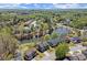 A lush community offering suburban living by a beautiful pond, all seen from an aerial perspective at 3950 Almandine Way, Cumming, GA 30040