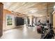 Unfinished basement with a black punching bag and an exercise bike at 3950 Almandine Way, Cumming, GA 30040