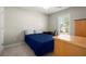 Comfortable bedroom with a desk area and ample natural light at 3950 Almandine Way, Cumming, GA 30040