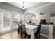 Dining area with a view to the living room with an abundant of natural light at 3950 Almandine Way, Cumming, GA 30040