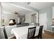 Dining area with view to living room with an abundant of natural light at 3950 Almandine Way, Cumming, GA 30040