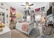 Bedroom filled with decorated walls, carpet, and a white bed frame at 4620 Westgate Dr, Cumming, GA 30040