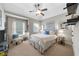Bedroom featuring a neutral color scheme, carpet, and natural light at 4620 Westgate Dr, Cumming, GA 30040