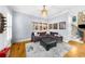 Cozy living room with hardwood floors, comfortable seating, and stylish decor, creating a relaxing atmosphere at 4620 Westgate Dr, Cumming, GA 30040
