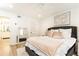 Comfortable main bedroom featuring a queen-sized bed, soft lighting, and an ensuite bathroom at 1101 Collier Nw Rd # U2, Atlanta, GA 30318