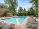 Beautiful community pool area with ample seating for relaxing and enjoying the outdoors at 1101 Collier Nw Rd # U2, Atlanta, GA 30318