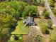Expansive aerial view of a traditional home with a large yard and mature trees at 1350 Blackwell Rd, Marietta, GA 30066