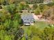Aerial view of a two-story house boasting mature landscaping and a backyard deck at 1350 Blackwell Rd, Marietta, GA 30066