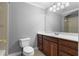 Bathroom showcasing a vanity with dark wood cabinetry and a combination shower and bathtub at 1350 Blackwell Rd, Marietta, GA 30066