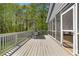 Outdoor deck featuring a screened-in porch and a built-in grill area at 1350 Blackwell Rd, Marietta, GA 30066