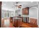 Chef's kitchen featuring a granite island, custom cabinetry, stainless appliances, and open layout at 1350 Blackwell Rd, Marietta, GA 30066
