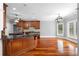 Kitchen featuring granite countertops, custom cabinets, hardwood floors, and stainless steel appliances at 1350 Blackwell Rd, Marietta, GA 30066