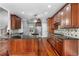 Gourmet kitchen featuring custom cabinets, granite countertops, a center island, and stainless steel appliances at 1350 Blackwell Rd, Marietta, GA 30066