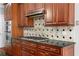 Kitchen features wooden cabinetry, granite countertops and stainless steel appliances at 1350 Blackwell Rd, Marietta, GA 30066