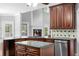 Spacious kitchen features granite countertops, custom cabinetry, and stainless steel appliances at 1350 Blackwell Rd, Marietta, GA 30066
