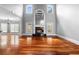 Bright living room boasting a fireplace, hardwood floors and large windows letting in natural light at 1350 Blackwell Rd, Marietta, GA 30066