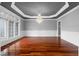 Open living room with hardwood floors, large windows, and a chandelier at 1350 Blackwell Rd, Marietta, GA 30066