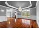 Elegant living room with hardwood floors, wainscoting, and a chandelier at 1350 Blackwell Rd, Marietta, GA 30066