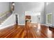 Open-concept design features hardwood floors, and seamless transitions to the staircase and adjacent kitchen at 1350 Blackwell Rd, Marietta, GA 30066