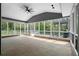 Expansive screened porch with ceiling fan, offering an indoor-outdoor living space at 1350 Blackwell Rd, Marietta, GA 30066