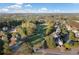 Beautiful aerial view of a residential neighborhood next to a lush green golf course on a sunny day at 139 Thunder Ridge Ln, Acworth, GA 30101