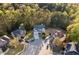 Stunning aerial view of a well-maintained home in a cul-de-sac with a lush, wooded backdrop at 139 Thunder Ridge Ln, Acworth, GA 30101