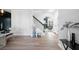 Spacious hallway offering a glimpse of the dining room, stairway, and living room at 139 Thunder Ridge Ln, Acworth, GA 30101