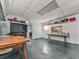 Basement with drop ceiling and space for multiple uses, ideal for entertaining or storage at 1606 Nuthatch Ct, Marietta, GA 30062