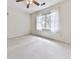 Sunlit bedroom with neutral carpet, and large windows at 1606 Nuthatch Ct, Marietta, GA 30062