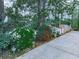 Well-maintained landscape with flowering bushes lining the driveway at 1606 Nuthatch Ct, Marietta, GA 30062