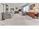 Spacious living room with a fireplace, built-in bookshelves, and ample seating at 1606 Nuthatch Ct, Marietta, GA 30062