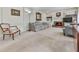 Cozy living room with fireplace, built-in shelving, and comfortable seating area at 1606 Nuthatch Ct, Marietta, GA 30062