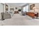 Spacious living room with a fireplace, built-in bookshelves, and ample seating at 1606 Nuthatch Ct, Marietta, GA 30062