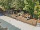 Community playground area featuring multiple slides, swings, and climbing structures for Gathering fun at 1606 Nuthatch Ct, Marietta, GA 30062